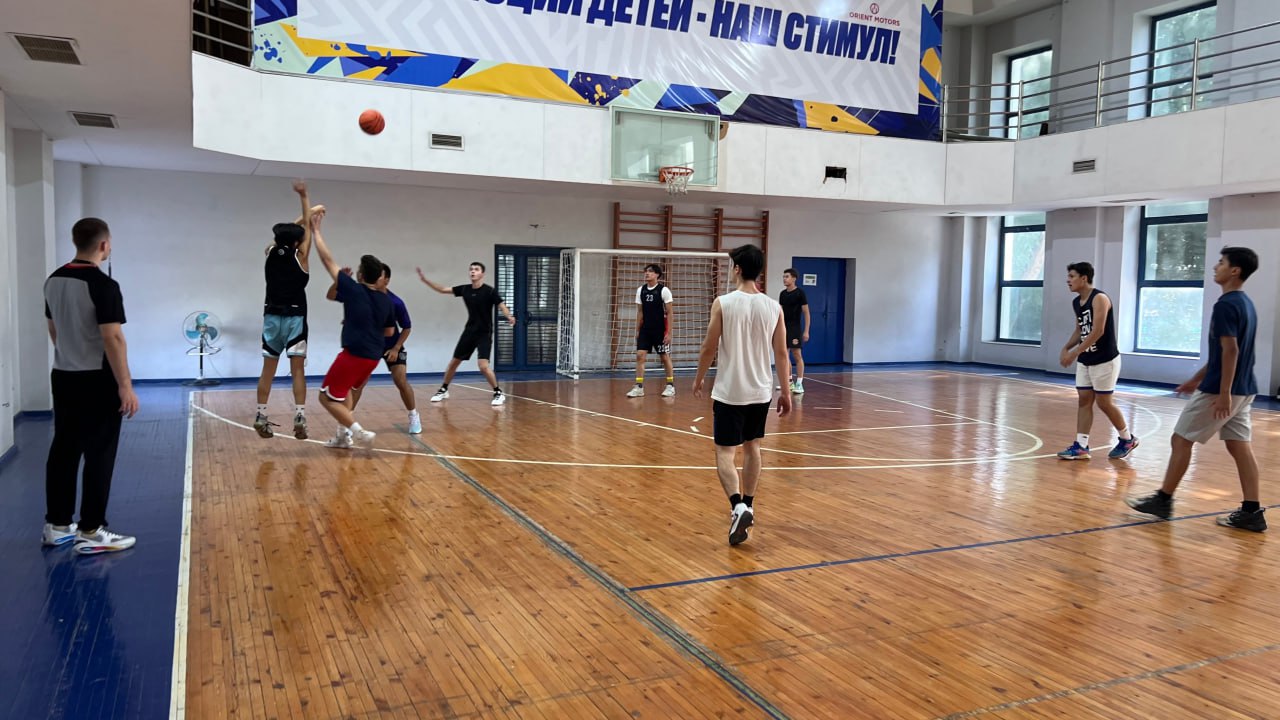 Students playing basketball