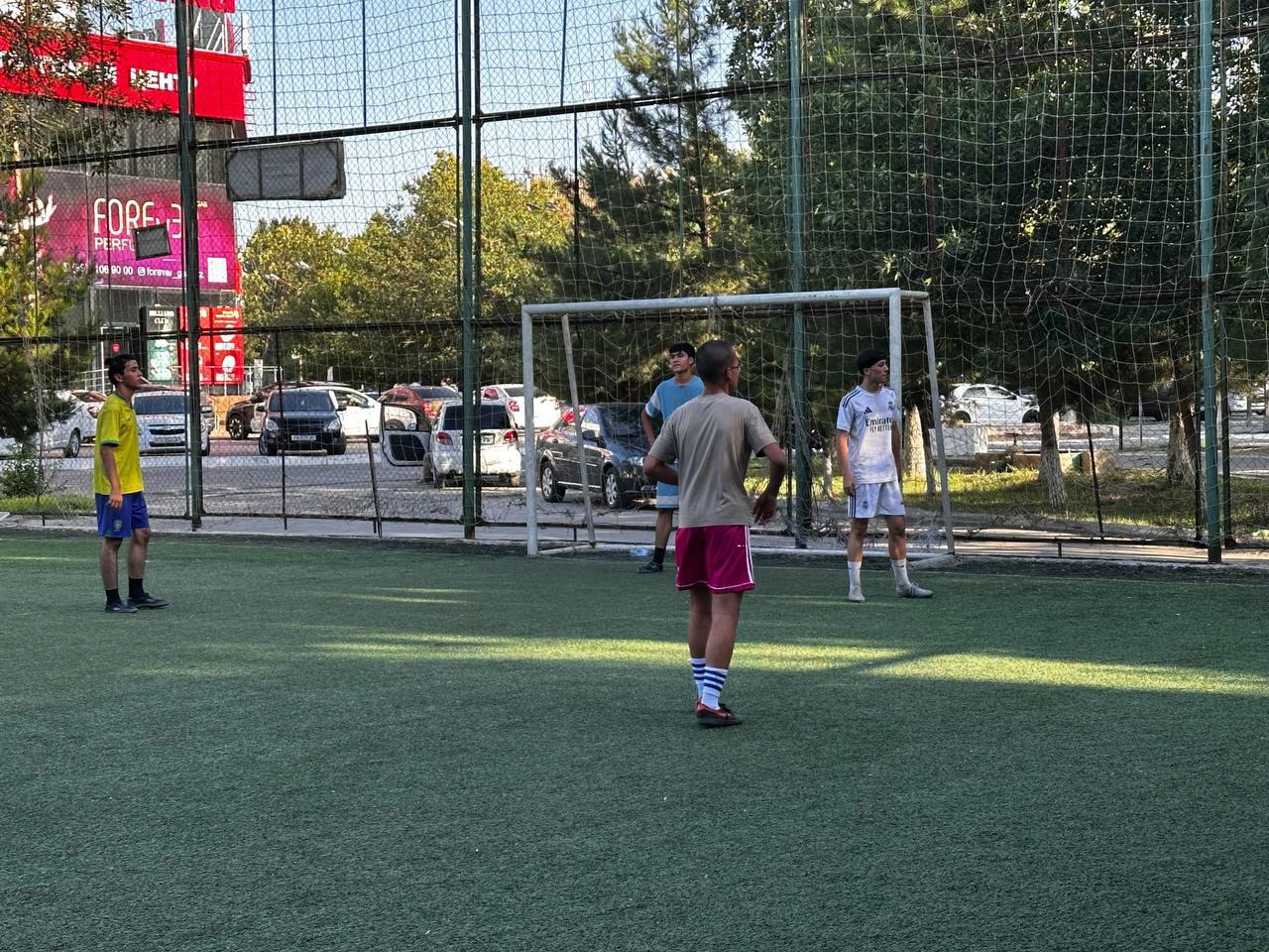 Students playing football at a TSC event