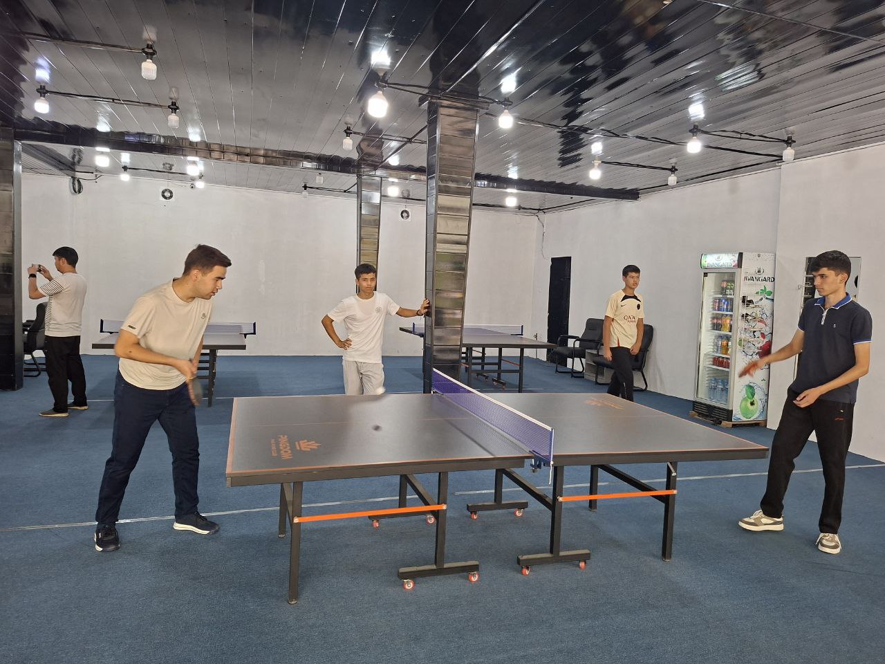 Students playing table tennis