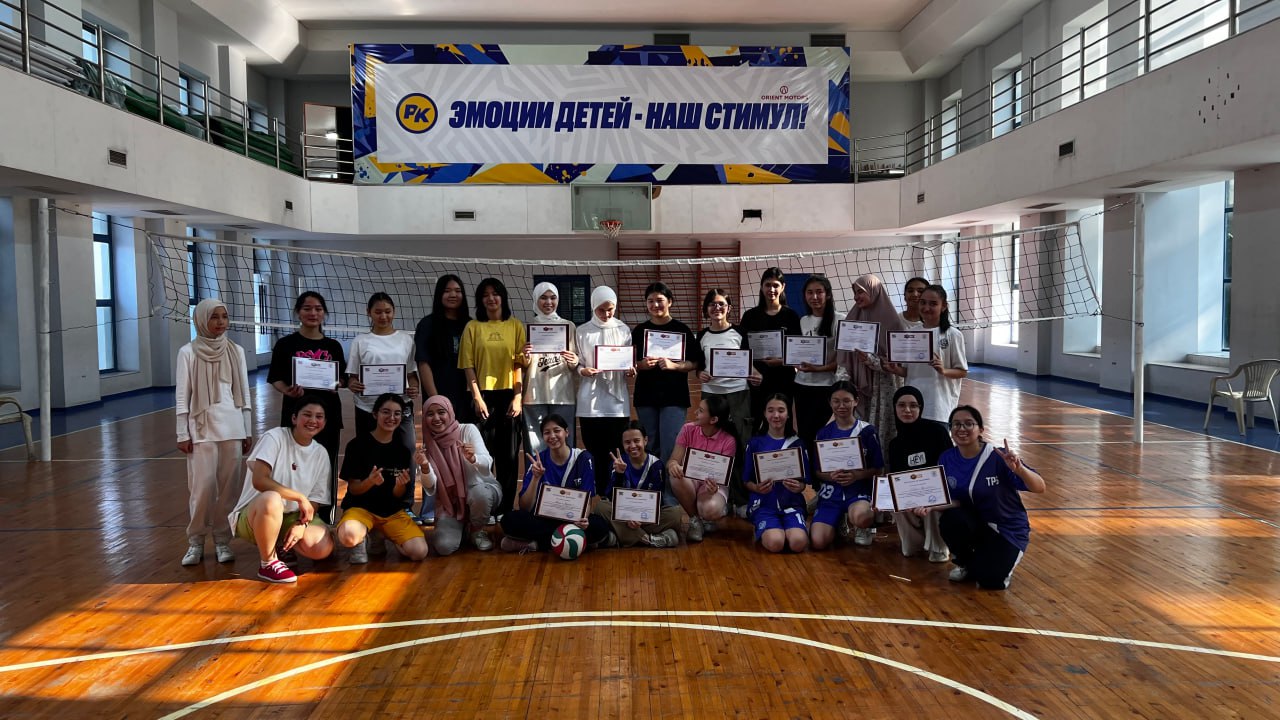 Athletes celebrating with certificates